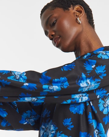 Printed Long Sleeve Peplum Top